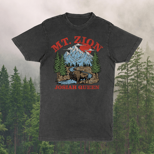 Black t-shirt with 'Mt. Zion Josiah Queen' graphic design on a forest background