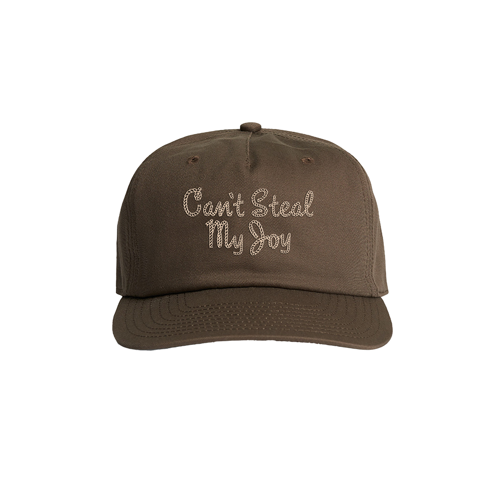 A brown baseball cap with the text 'Can't Steal My Joy' embroidered on the front.