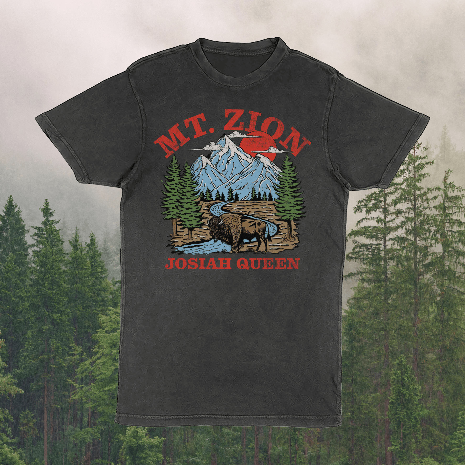 Black t-shirt with 'Mt. Zion Josiah Queen' graphic design on a forest background